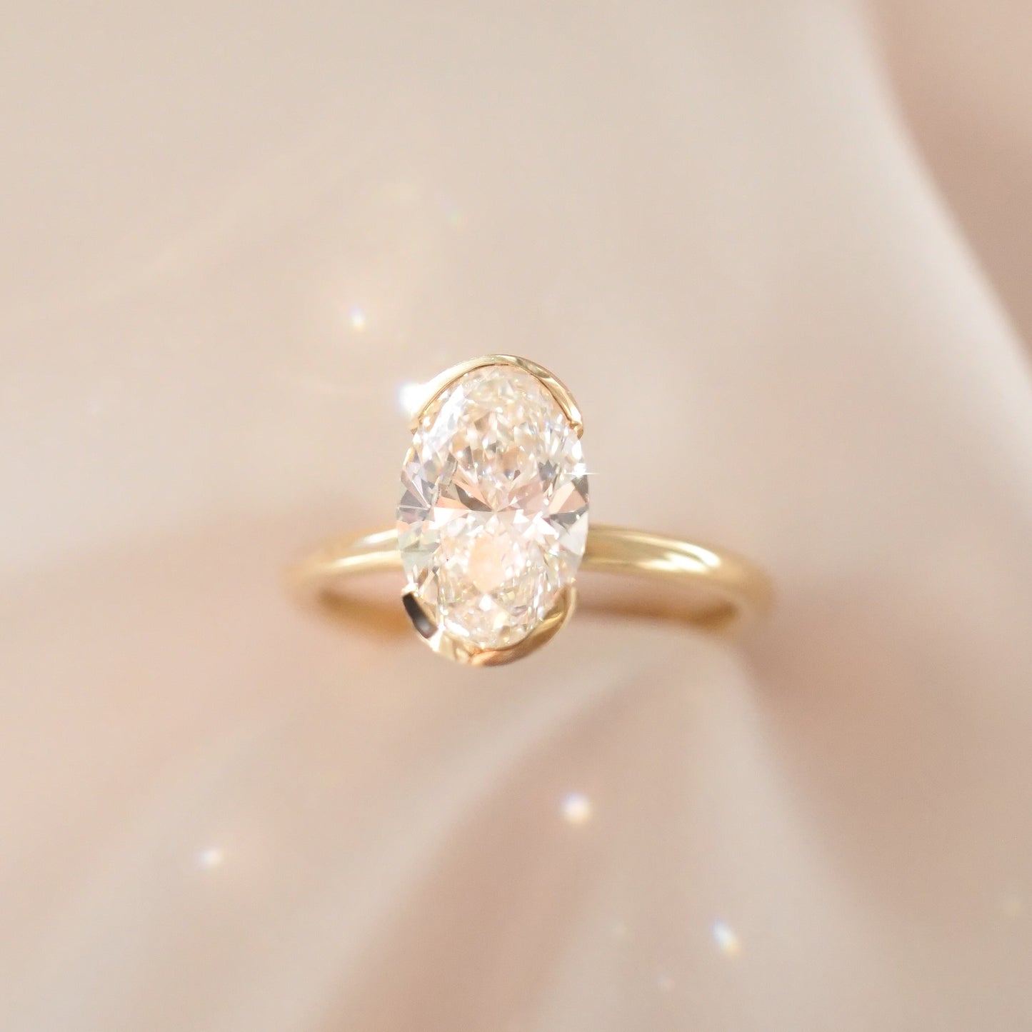 Oval Shaped Half Bezel Lab Grown Diamond Engagement Ring