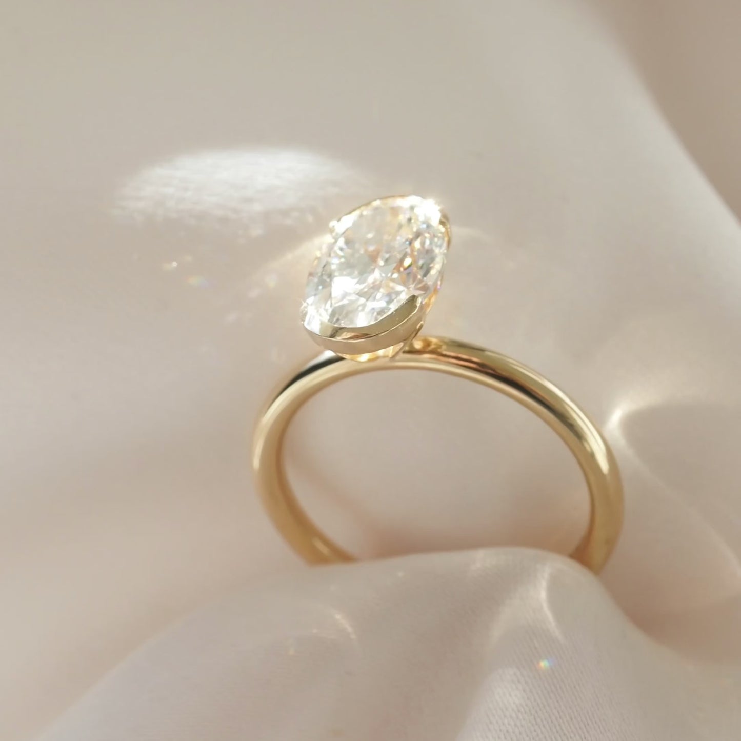 Oval Shaped Half Bezel Lab Grown Diamond Engagement Ring
