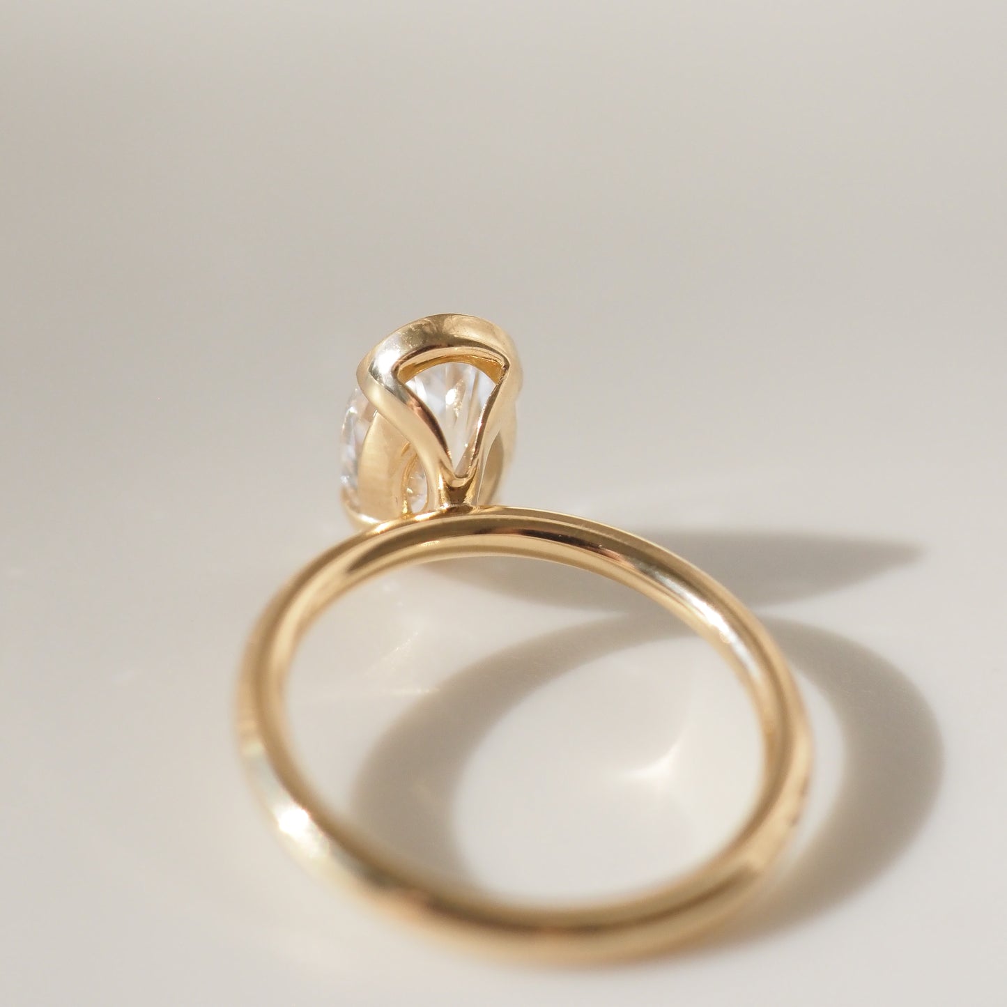 Oval Shaped Half Bezel Lab Grown Diamond Engagement Ring