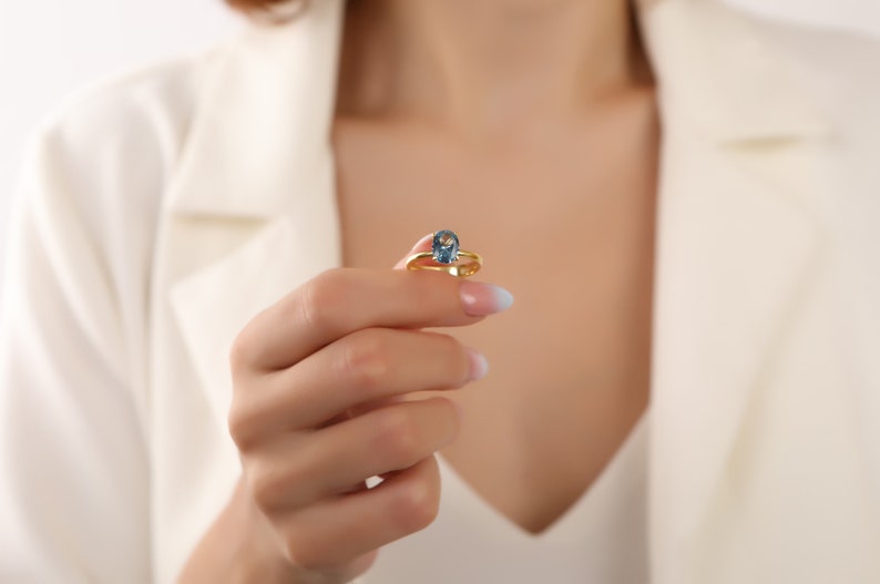 Oval Solitaire Blue Topaz Gemstone Engagement Ring
