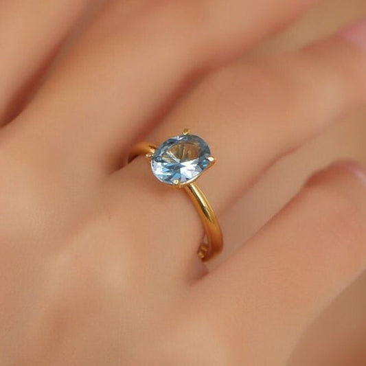 Oval Solitaire Blue Topaz Gemstone Engagement Ring